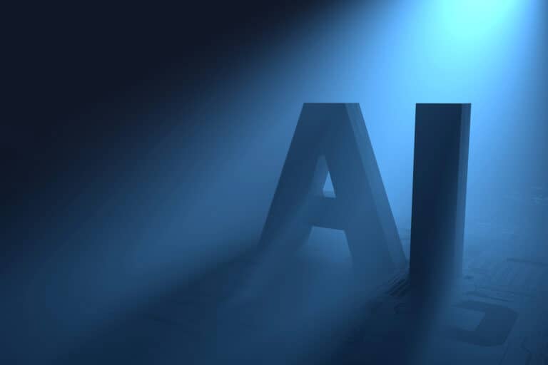 Großes AI-Symbol in dunklem Licht mit blauer Beleuchtung.